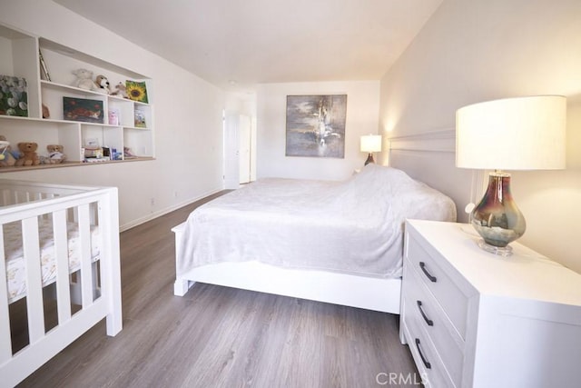 1617 S Beverly Glen Blvd Unit 303, Los Angeles, CA 90024 - bedroom featuring dark wood finished floors