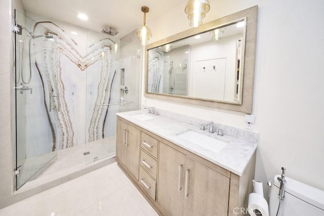 1617 S Beverly Glen Blvd Unit 303, Los Angeles, CA 90024 - bathroom with toilet, a marble finish shower, double vanity, recessed lighting, and tile patterned flooring