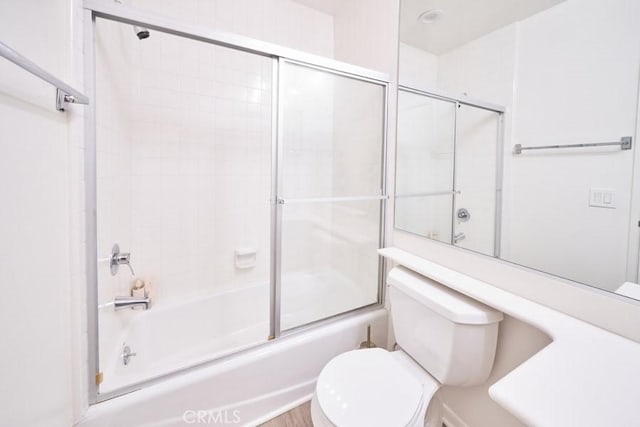 1617 S Beverly Glen Blvd Unit 303, Los Angeles, CA 90024 - bathroom with toilet and combined bath / shower with glass door