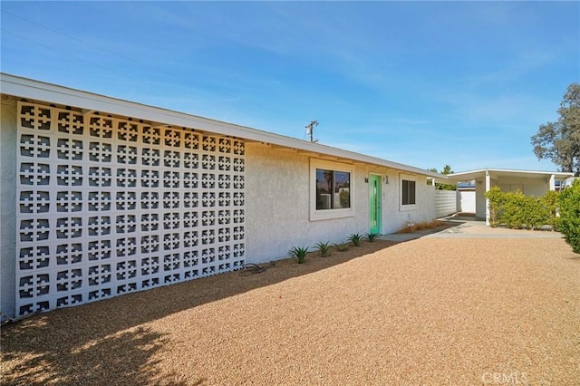 view of front of home with stucco siding