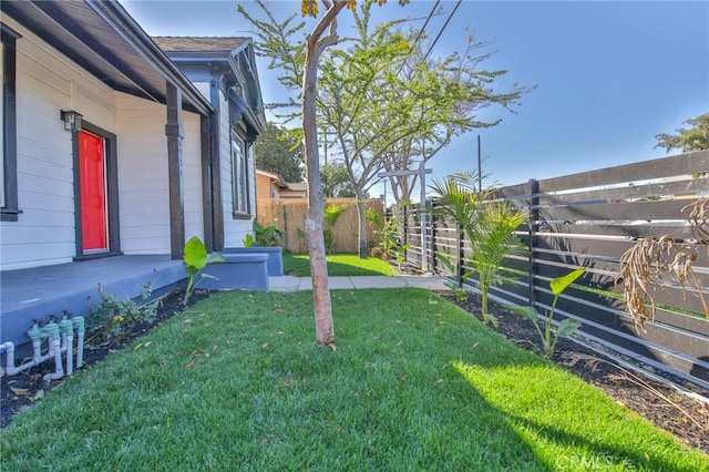 view of yard with fence