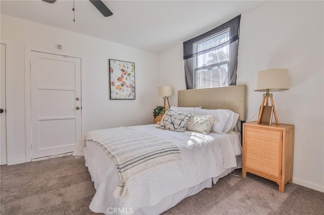 carpeted bedroom featuring a ceiling fan