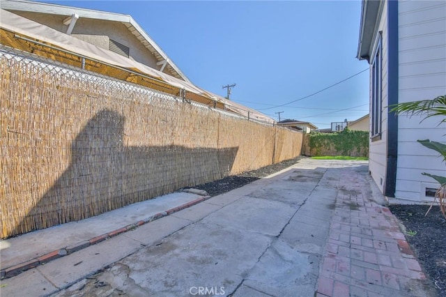 exterior space featuring a fenced backyard