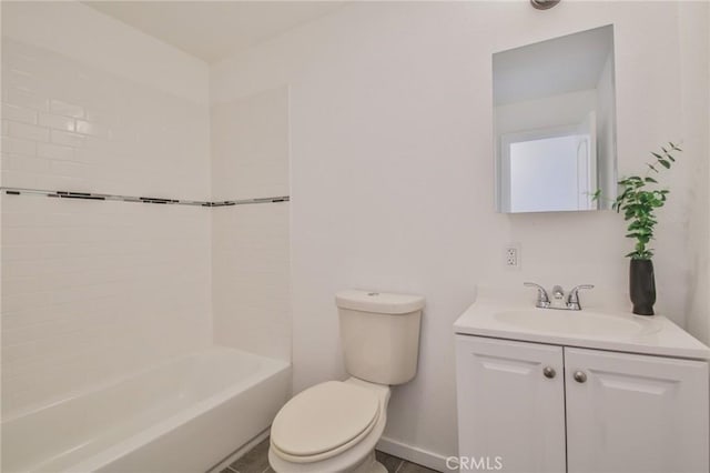 bathroom with shower / bathing tub combination, vanity, toilet, and baseboards