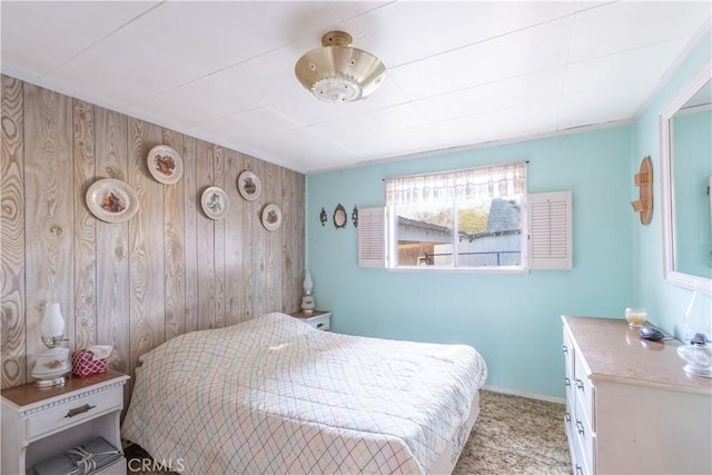 bedroom with light colored carpet