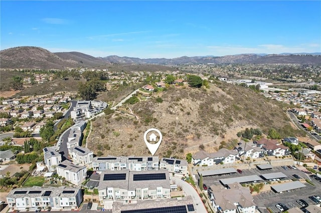 aerial view with a residential view and a mountain view