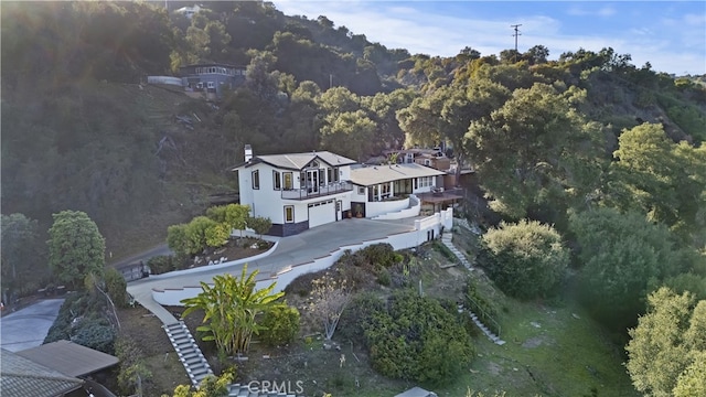 aerial view featuring a view of trees