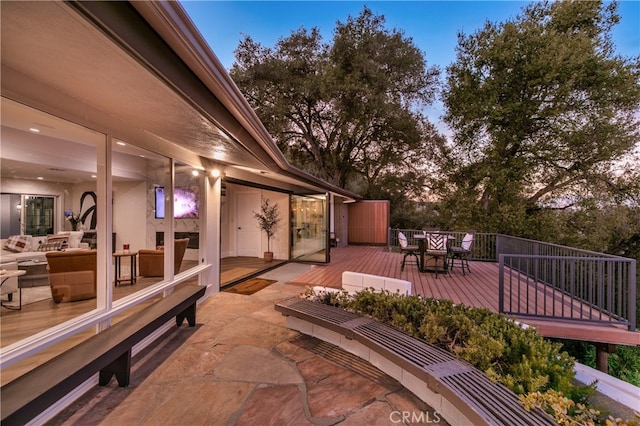 wooden deck with outdoor dining space