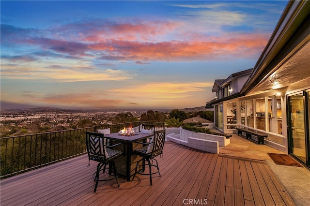 view of deck at dusk