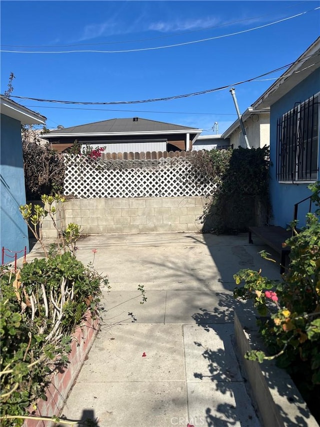 view of patio with fence