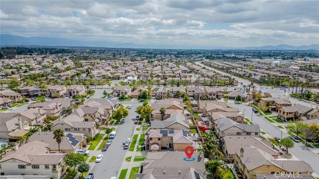 aerial view featuring a residential view and a mountain view