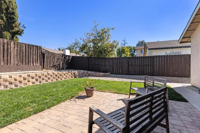 view of patio with a fenced backyard