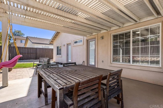 view of patio / terrace featuring fence, outdoor dining area, and a pergola