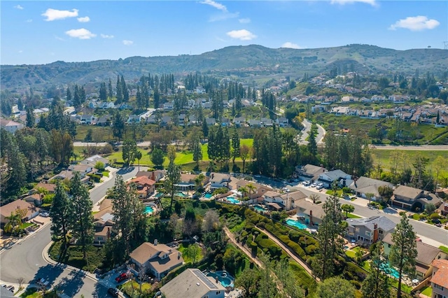 bird's eye view with a residential view and a mountain view