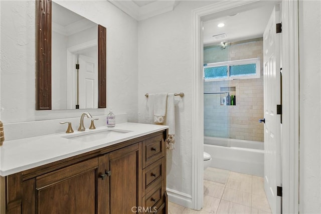 full bath featuring toilet, vanity, tub / shower combination, tile patterned floors, and crown molding