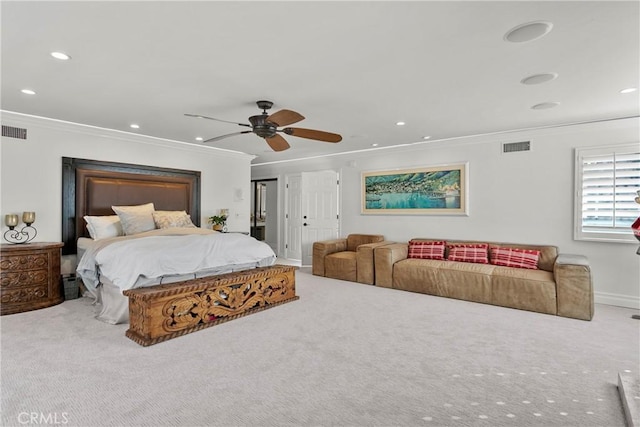 bedroom with recessed lighting, carpet flooring, and crown molding