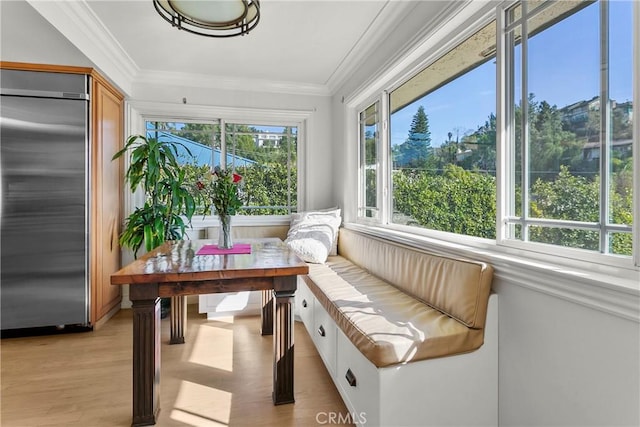 sunroom / solarium featuring plenty of natural light