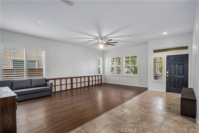 40467 Tiger Way, Palmdale, CA 93551 - unfurnished living room featuring recessed lighting, baseboards, ceiling fan, and visible vents