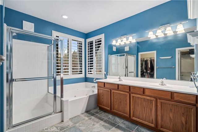 40467 Tiger Way, Palmdale, CA 93551 - bathroom featuring double vanity, a whirlpool tub, a sink, and a stall shower