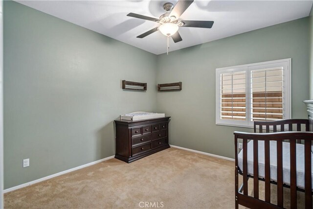 40467 Tiger Way, Palmdale, CA 93551 - bedroom with a ceiling fan, baseboards, and carpet