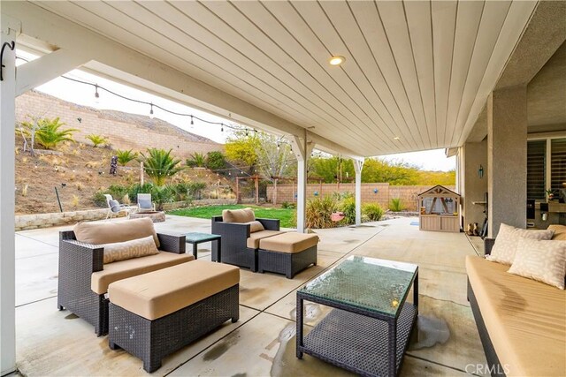 40467 Tiger Way, Palmdale, CA 93551 - view of patio / terrace featuring an outdoor hangout area and a fenced backyard