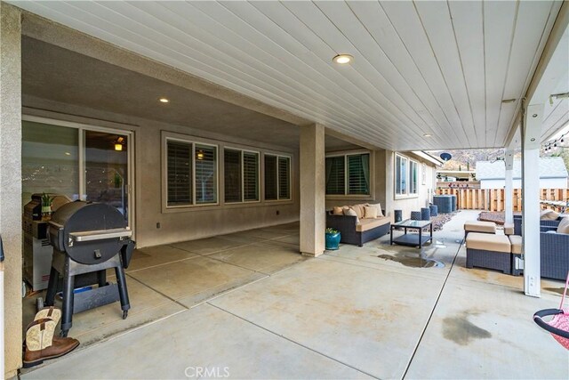 40467 Tiger Way, Palmdale, CA 93551 - view of patio featuring central air condition unit, outdoor lounge area, and fence