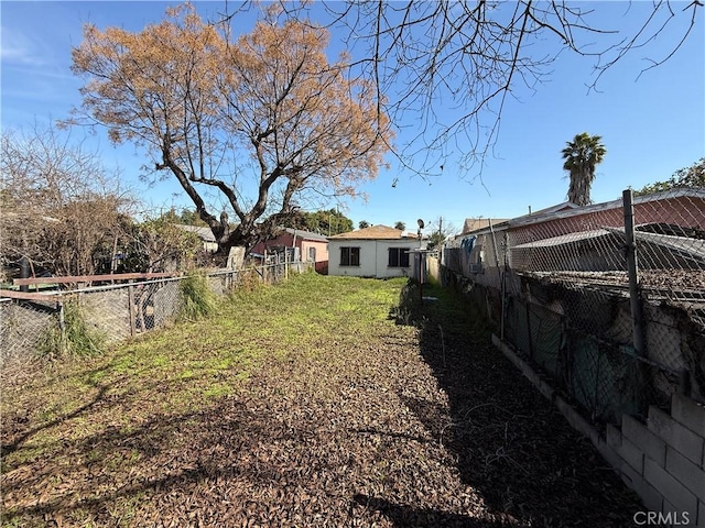 view of yard with fence