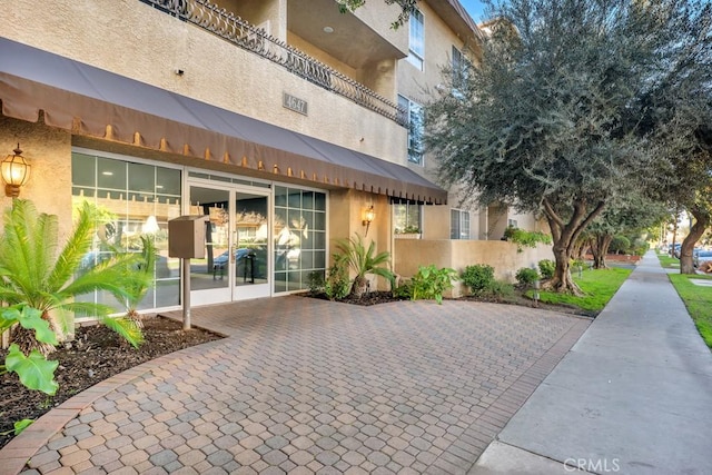 exterior space featuring stucco siding