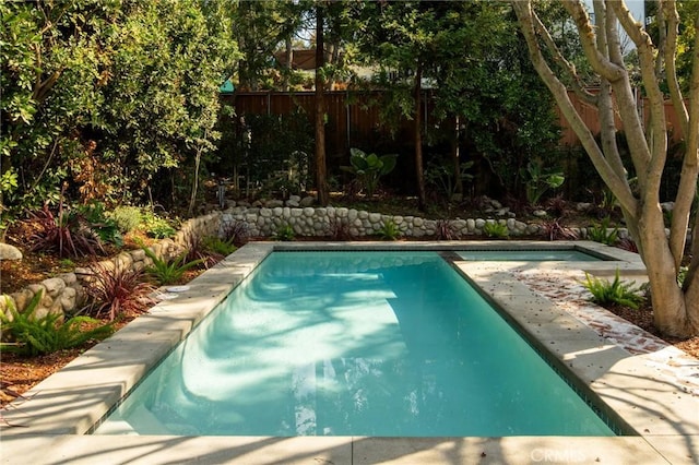 view of pool featuring fence and a fenced in pool