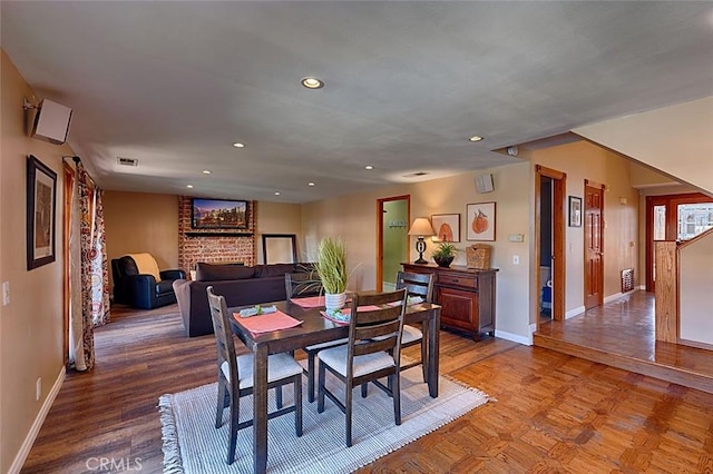 dining room with visible vents, parquet floors, recessed lighting, and baseboards