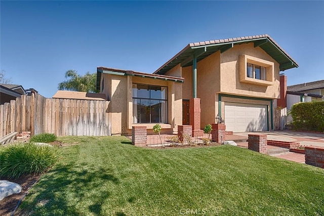 back of house with stucco siding, a lawn, a garage, and fence