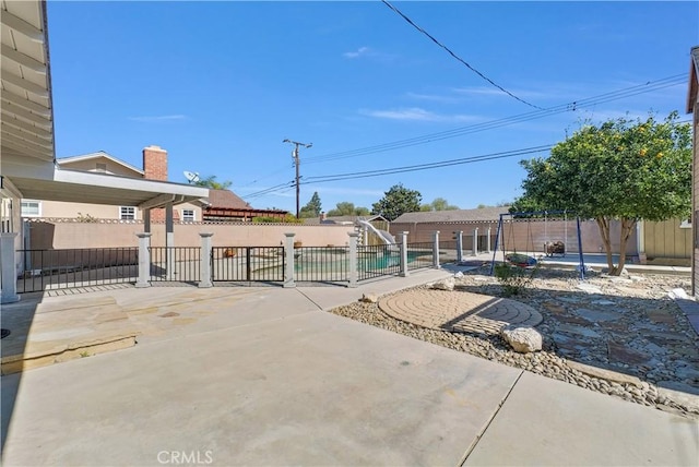 view of yard featuring a patio and a fenced backyard