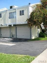 view of property featuring a garage