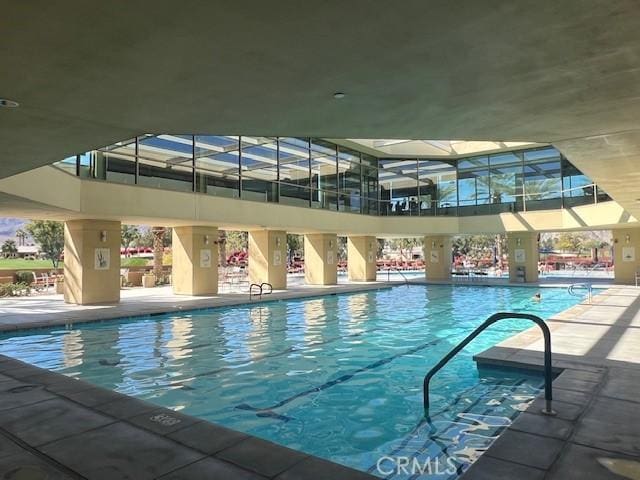 60310 Desert Rose Dr, La Quinta, CA 92253 - indoor pool featuring a patio