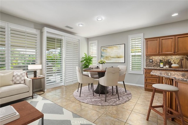 60310 Desert Rose Dr, La Quinta, CA 92253 - dining space with recessed lighting and baseboards