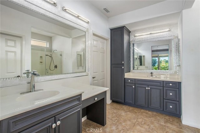60310 Desert Rose Dr, La Quinta, CA 92253 - full bath featuring a stall shower, two vanities, and plenty of natural light