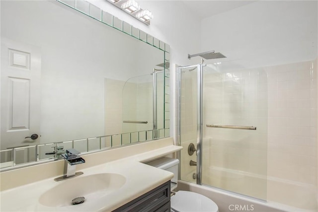 60310 Desert Rose Dr, La Quinta, CA 92253 - full bathroom featuring toilet, vanity, and bath / shower combo with glass door