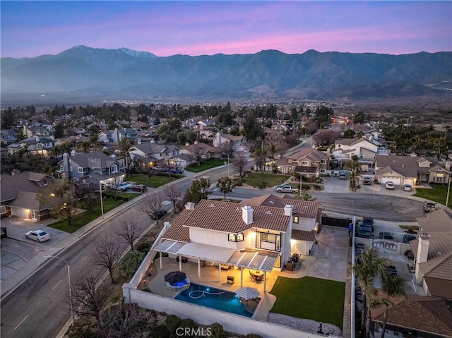 14201 Ross Ct, Rancho Cucamonga, CA 91739 - aerial view at dusk of a mountain view and a residential view