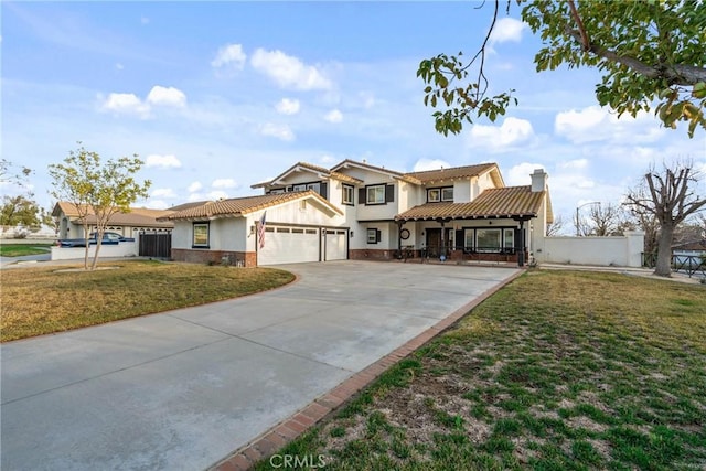 14201 Ross Ct, Rancho Cucamonga, CA 91739 - mediterranean / spanish house featuring an attached garage, stucco siding, driveway, and a chimney