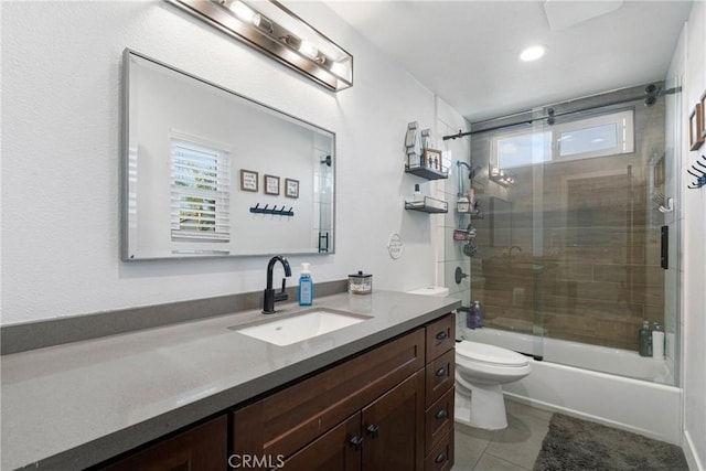 14201 Ross Ct, Rancho Cucamonga, CA 91739 - full bathroom featuring vanity, shower / bath combination with glass door, tile patterned flooring, and recessed lighting