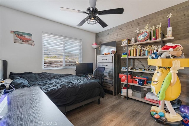 14201 Ross Ct, Rancho Cucamonga, CA 91739 - bedroom featuring wood walls, wood finished floors, and a ceiling fan