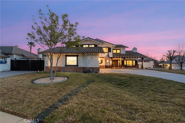 14201 Ross Ct, Rancho Cucamonga, CA 91739 - view of front facade featuring a chimney, stucco siding, brick siding, and concrete driveway
