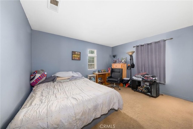 carpeted bedroom with visible vents