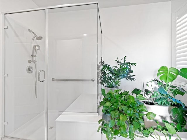 bathroom with an enclosed shower