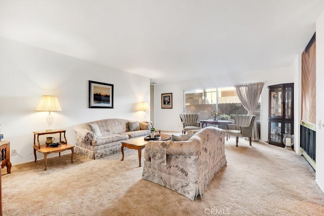 living room with light colored carpet