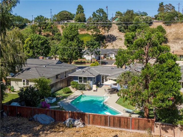 view of swimming pool with a fenced in pool, a patio area, and a fenced backyard