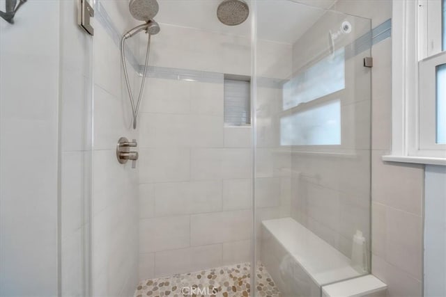 full bath featuring a stall shower