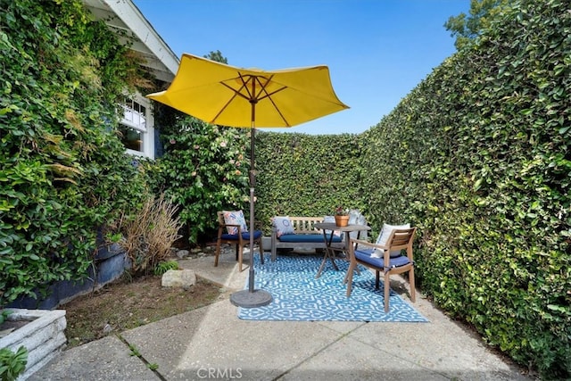 view of patio / terrace with fence and outdoor lounge area