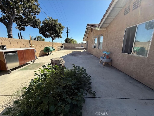 view of patio featuring a fenced backyard