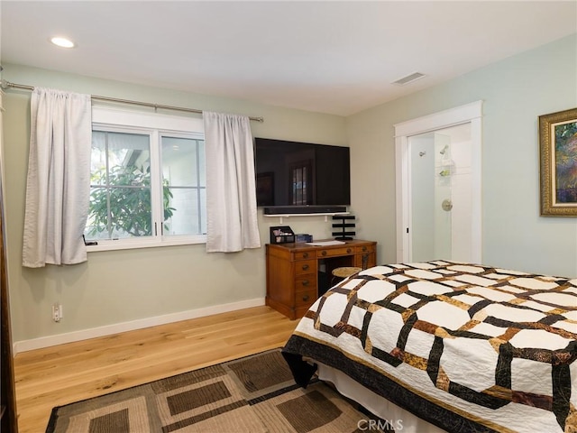 bedroom featuring visible vents, recessed lighting, light wood-style flooring, and baseboards